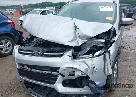 2016 Ford Escape Titanium из США, поврежденный, VIN 1FMCU0J94GUB70214